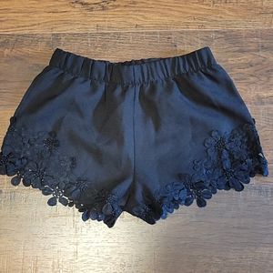 Black shorts with lace side details